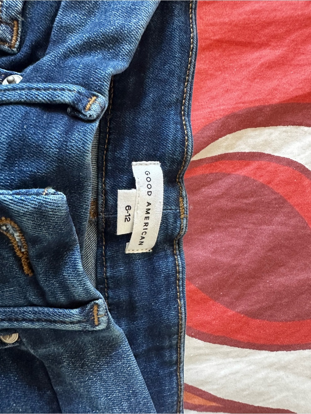 Good American flare stretch jeans.